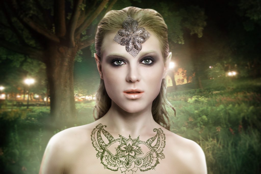 beautiful elf woman in a magical forest