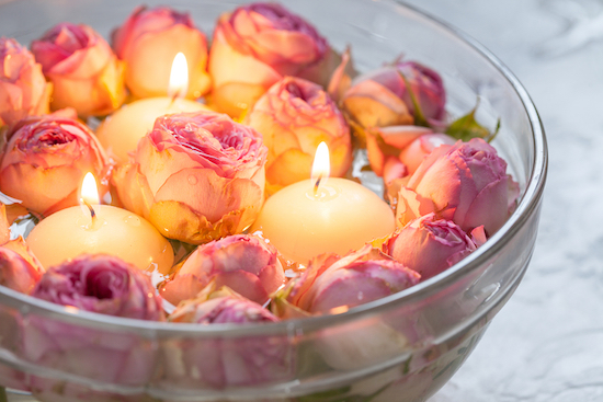Pink Roses and lit candles