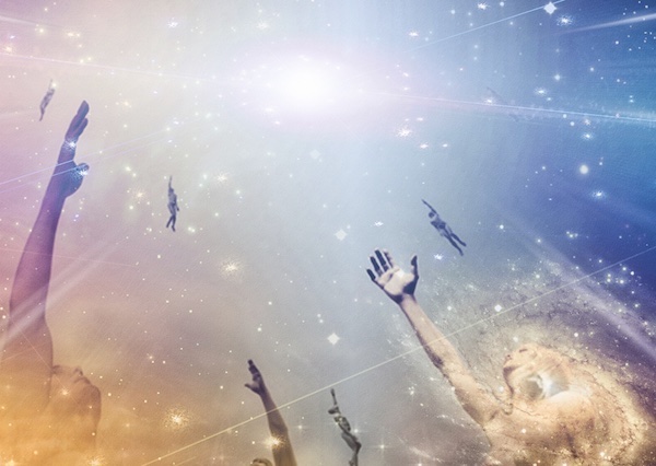 People soaring toward light amongst stars